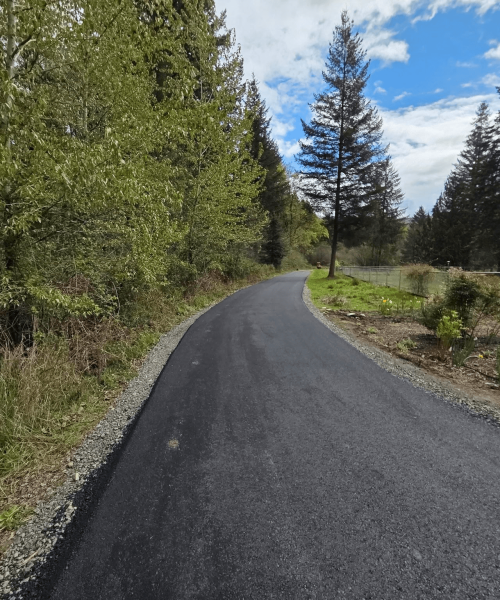 Finished gravel driveway repaired and regraded by Brynion Excavation